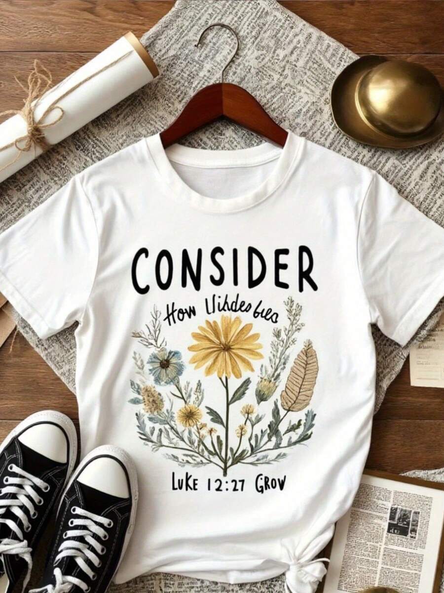 Camiseta de manga corta de mujer - una camiseta blanca con un diseño inspirado en el crecimiento de lirios de Lucas 12:27. Hecho de tela elástica, suave, es adecuado para el desgaste casual, lavable en máquina