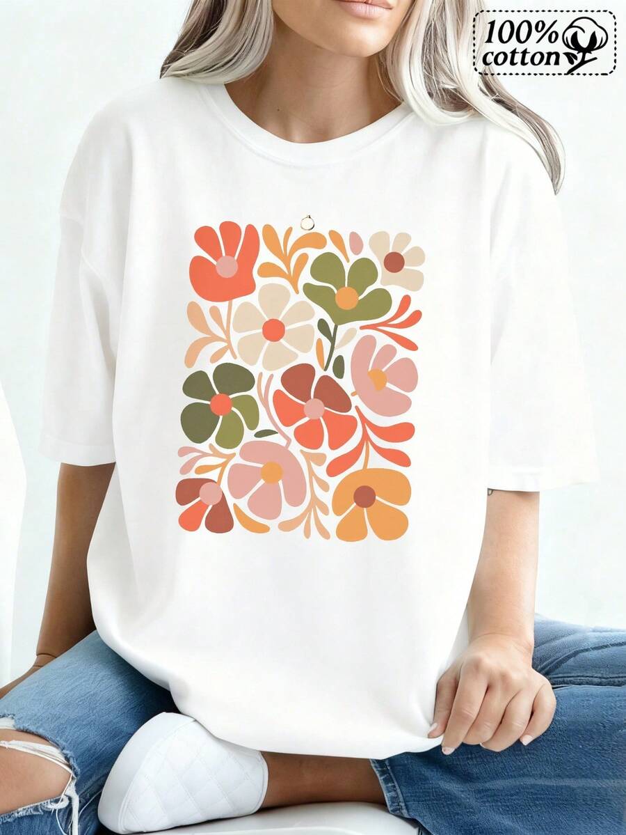 Camiseta blanca de mujer con diseño floral en el frente, perfectara salidas informales y relación