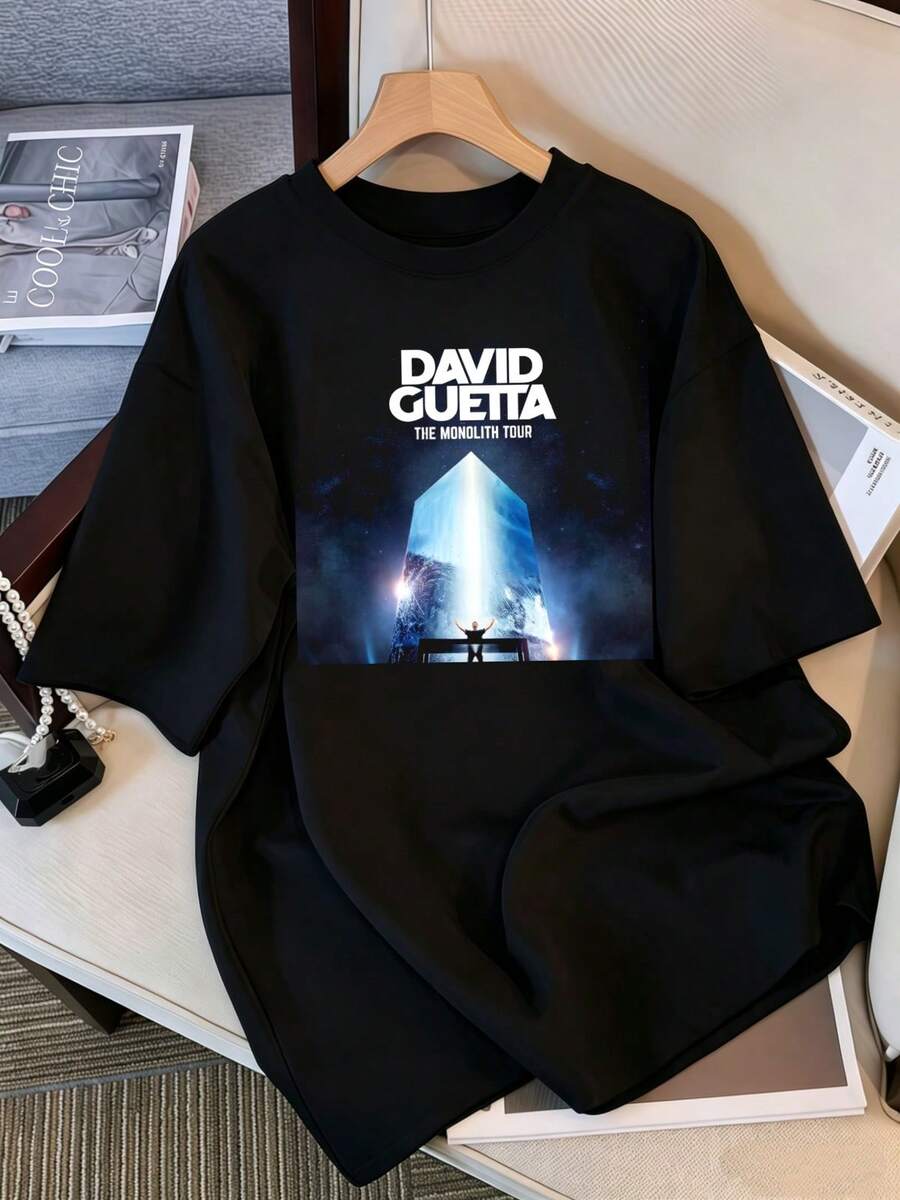 2026 T-Shirt, David Guetta The Monolith Tour Concert Graphic T-Shirt, EDM World Tour Oversized T-Shirt, Black Cotton Casual Top, Retro Bootleg Style K-Pop Idol Oversized T-Shirt, Vintage Graphic Print T-Shirt, Short Sleeve Casual Top, K-Pop Fan Merchandise, Black Streetwear T-Shirt For Fans, Vintage Graphic K-Pop Star T-Shirt, Short Sleeve Oversized T-Shirt With Retro Lightning Bolt Letter Print, Black Crew Neck Casual Top, Streetwear Style Idol Fan Gift, Comfortable Loose Fit Cotton Blend T-Shirt For Women And Men. - Black - View 1