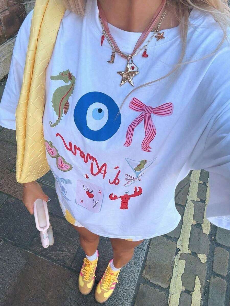 Camiseta de mujer "Estilo mediterráneo de la Amalfitana", ajuste regular, camiseta con patrón artístico pintado a mano, cómoda blusa de manga corta de verano italiano, cuello redondo único, estilo retro de ocio y gastronomía, moda casual blanca - Negro - Ver 1