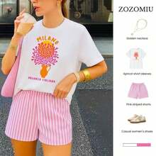 Una camiseta de manga corta para mujer con estilo retro americano, de corte holgado y con diseño estampado (los pantalones son solo para sugerencias de estilo). Esta pieza sencilla y elegante presenta un patrón de letras impresas con temática tropical, lo que la convierte en un elemento imprescindible para crear un look relajado de vacaciones, perfecto para ocasiones como el Día del Trabajo y el Día de la Independencia de México. - Blanco - Ver 8