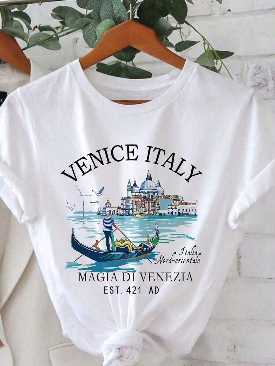Camiseta de mujer Casual Minimalista con estampado de castillo "Venecia, Italia" sobre el mar, corte holgado, cuello redondo, manga corta, ligeramente transparente, adecuada para el verano y para salir.Pure-Cotton - Blanco - Ver 1