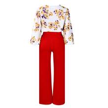 Conjunto profesional OL de dos piezas para mujer talla grande: top con estampado floral y nudo frontal, junto con pantalones de pierna ancha - naranja - Ver 6