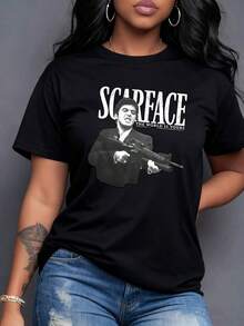 La feroz determinación de un hombre en su búsqueda implacable de poder y riqueza reflejada en la icónica frase El mundo es tuyo un símbolo de ambición inquebrantable Camiseta de mujer 100% algodón,maija mujer curvy. - Negro - Ver 7