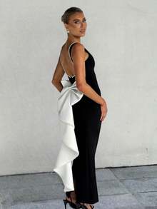 Vestido largo sin mangas de color negro y blanco con estilo de dama, nuevo modelo de primavera y verano 2026, estilo chica atrevida con espalda descubierta y lazo de perlas. - Negro - Ver 3