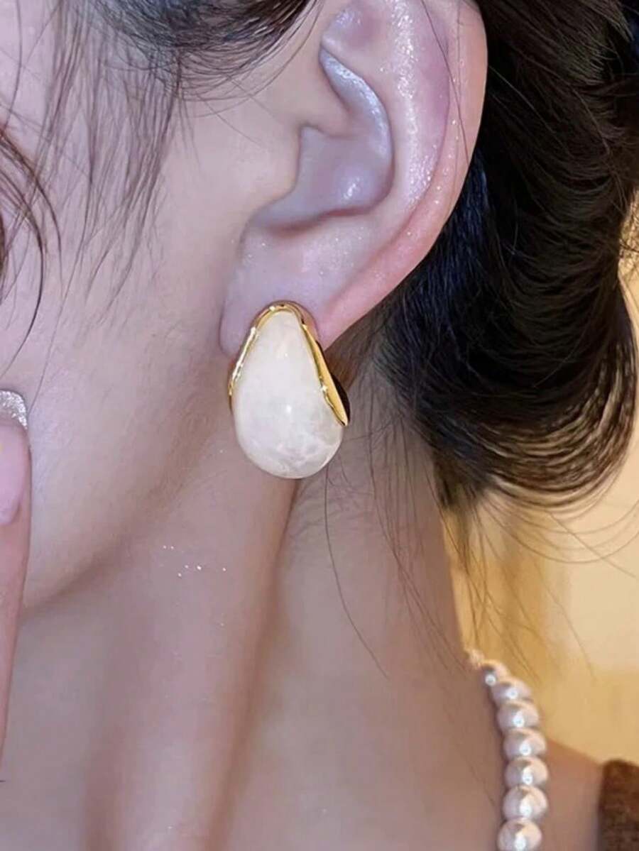 一对独特时尚的仿珍珠耳环,优雅的设计彰显您的个性,适合派对、宴会和日常佩戴。 - 水滴 - 查看 1