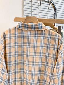 Áo sơ mi nữ dài tay kẻ caro xanh dương, chất liệu polyester, kiểu dáng thường ngày. - trái cam - Xem 5
