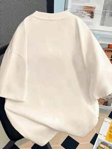 Playera Oversize para Mujer en Color Beige Neutro de Algodón con Estampado Divertido de Paloma Azul con Texto Humorístico "Huele a Migajera" Estilo Moderno y Relajado para Outfits Originales - Blanco - Ver 2