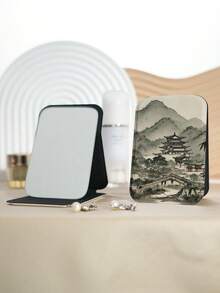 1个中式花卉折叠化妆镜，轻巧便携，采用耐用PU皮革材质，适用于各种场合，饰有优雅的水墨亭台花卉图案，可折叠结构，可靠且便于携带。 - 彩色 - 查看 18