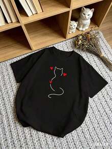 Manga cortaTalla grande - Camiseta de mujer de talla grande, camiseta de corte holgado, cuello redondo negro con estampado de corazón y gato, manga corta, corte ligeramente holgado y cómodo para primavera, verano y otoño, top casual dulce y fresco para el tiempo libre. - Negro - Ver 2