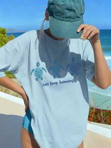 Women's Blue Short-Sleeved T-Shirt With A Round Neck And Turtle Print, A Casual Spring And Summer Style With A Modern Design Suitable For Everyday Wear On Vacation. Graphic T-Shirts For Women, Pink And Black - 淺藍色 - 查看 7