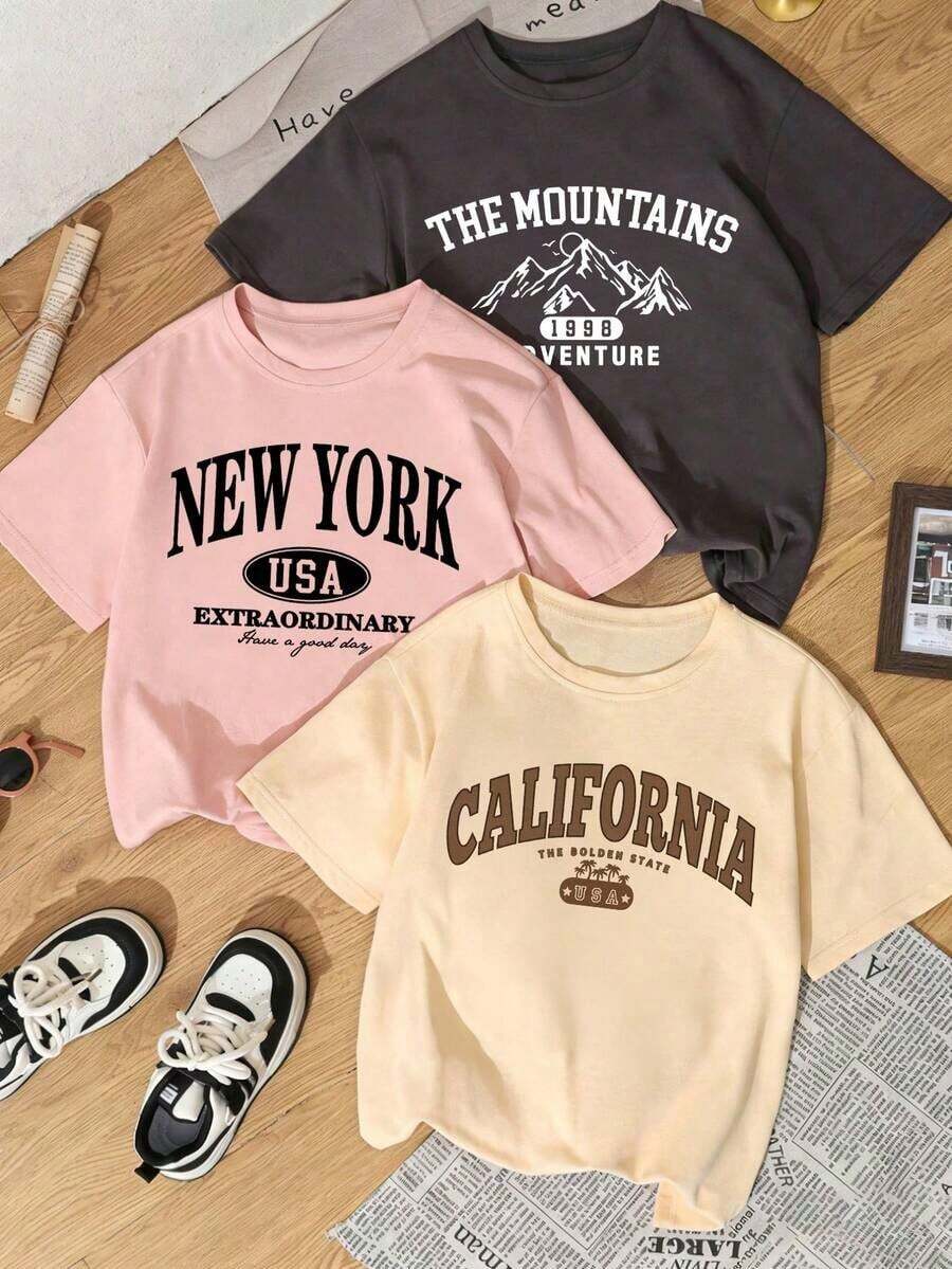 1 pieza de camiseta de manga corta con cuello redondo, holgada, versátil, con un bonito diseño casual para mujer, top moderno para uso diario, adecuado para uso casual y de vacaciones. Conjunto de camiseta de manga corta para mujer, nuevo de verano, con estampado divertido de monumentos, 1 pieza. - Albaricoque - Ver 1