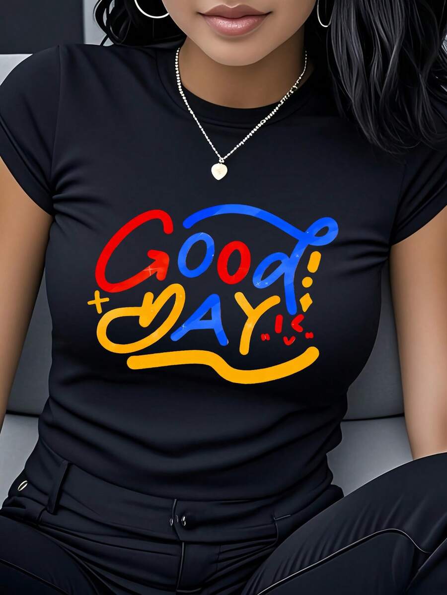 Camiseta con estampado de texto inspirador "Good Day", de manga corta y cuello redondo, ropa de mujer con un toque de diseño lleno de estilo graffiti vibrante, que transmite una actitud positiva y optimista, adecuada para el uso diario, salidas informales, reuniones con amigos, moda urbana, que muestra individualidad, expresa el amor por la vida, puede usarse como regalo de cumpleaños o para las fiestas para familiares y amigos, transmitiendo buenos deseos y brindando alegría, camiseta de algodón puro con estampado para mujer. - Negro - Ver 1