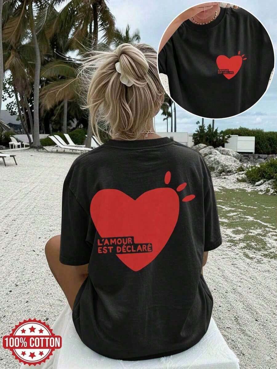 Camisetas Gráficas 2026 con Estampado de Doble Cara para Mujer, Primavera/Verano, Estilo Casual, Estilo Minimalista, Estampado de Corazón y Texto "L'AMOUR EST DÉCLARÉ", Cuello Redondo, Manga Corta, Corte Holgado, Camiseta Oversize, 100% Algodón ChuK - Negro - Ver 1