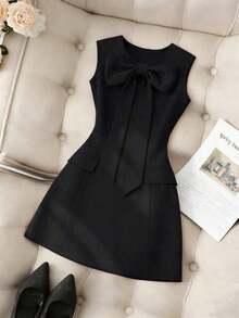 Vestido de mujer de unicolor, cuello redondo, ajustado, con lazo delantero y sin mangas - Negro - Ver 8