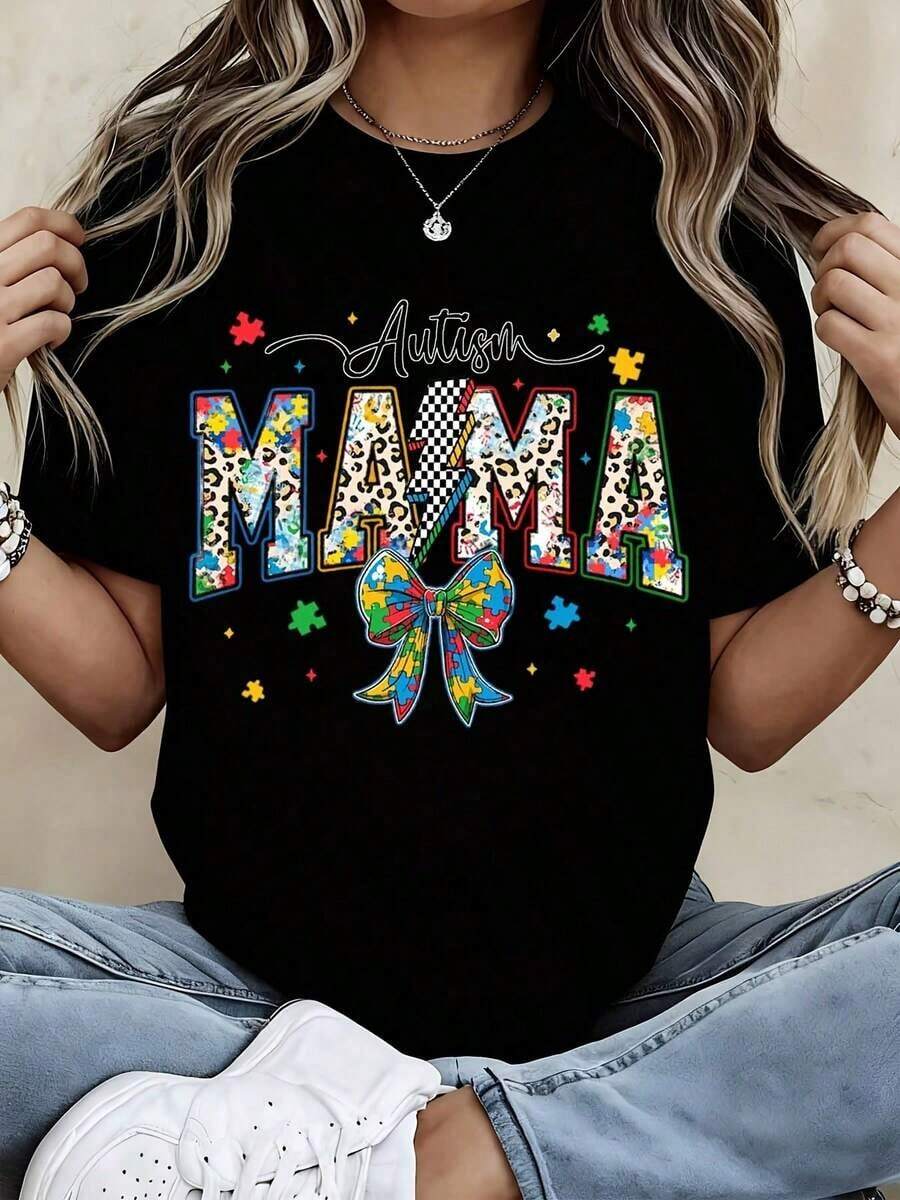 Camiseta " Mama" con diseño de piezas de rompecabezas coloridas y estampado de leopardo para eventos de concientización y maternidad. - Negro - Ver 1