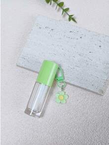 1 cái hộp đựng son bóng rỗng 6ml màu hồng, trắng, tím, xanh lá cây, xanh dương, có cọ lớn, kèm ống đựng son bóng và dầu dưỡng môi, có móc khóa hình hoa. - Nhiều màu - Xem 4