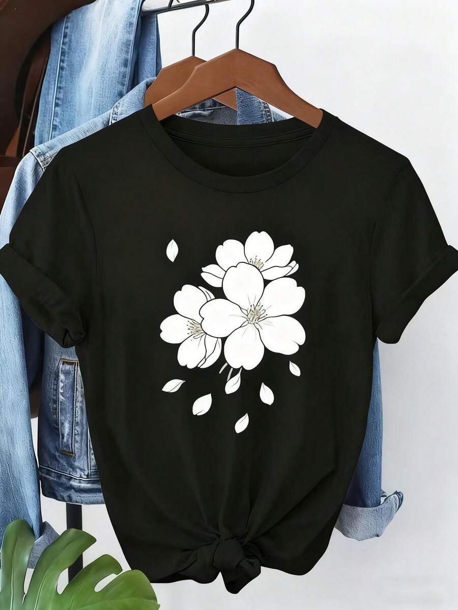 1 pieza de camiseta oversize para mujer con estampado de flores de cerezo blancas y pétalos caídos - Top casual de manga corta con cuello redondo, corte holgado, blusa para todas las estaciones, ideal para atuendos casuales, regalo de Navidad, conjuntos florales de primavera (negro con diseño floral blanco). - Negro - Ver 1