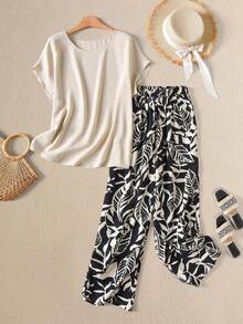 Conjunto de 2 piezas para mujer con blusa de unicolor de cuello redondo y manga corta, y pantalones anchos con estampado de flores para el verano - Multicolor - Ver 4