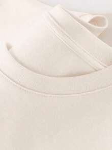 Playera Oversize para Mujer en Color Beige Neutro de Algodón con Estampado Divertido de Paloma Azul con Texto Humorístico "Huele a Migajera" Estilo Moderno y Relajado para Outfits Originales - Blanco - Ver 3