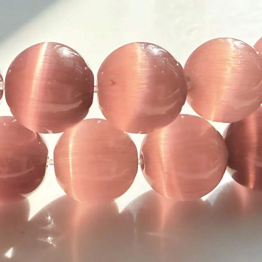 天然石深紫色猫眼独特闪光圆形散珠,适用于珠宝制作DIY,可制作精美手链、项链、耳环等配饰,是送给女性的礼物,也适合婚礼、派对和家居装饰。 - Beads - 查看 1