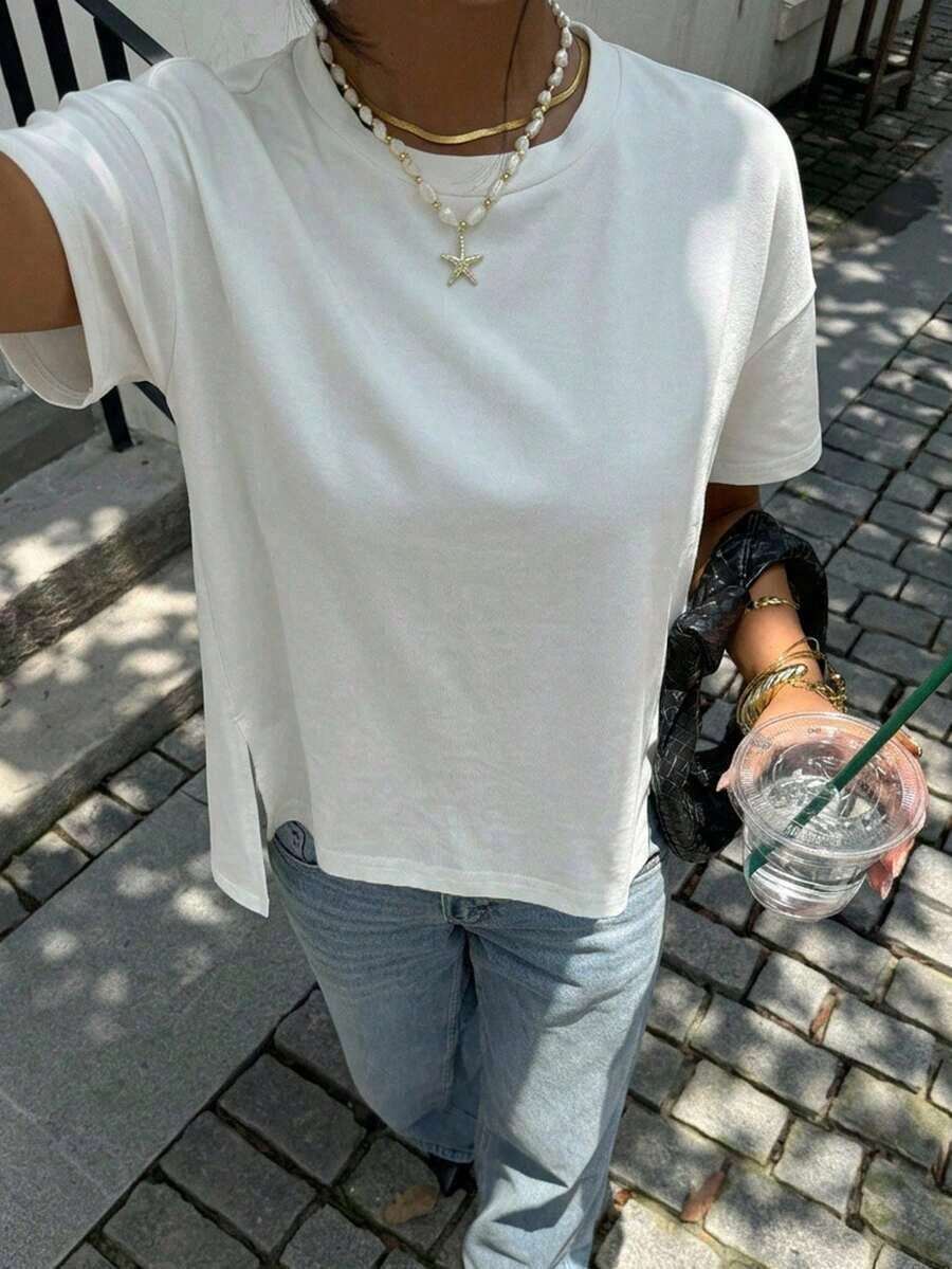 Camiseta holgada de estilo minimalista casual para mujer, con parte delantera corta y parte trasera larga, versátil para usar en la calle, adecuada para primavera y verano - Blanco 4 - Ver 1
