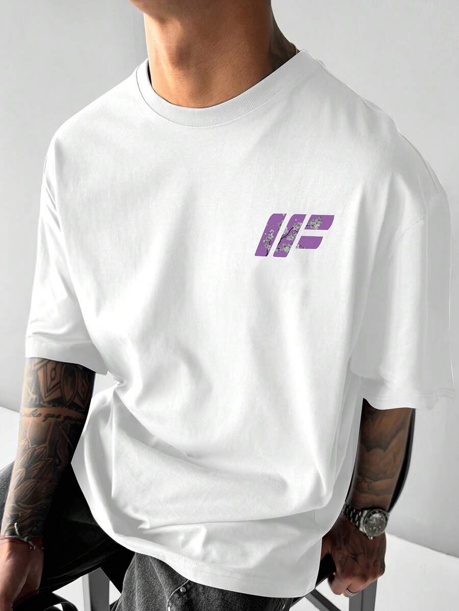 Camiseta con estampado de flores de cerezo de Tokio, para uso diario, versátil, de manga corta y cuello redondo, diseño casual estampado en la espalda para hombre, camiseta de cuello redondo con hombros ligeramente caídos. - Blanco - Ver 1