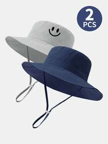 2 piezas Sombrero de sol para niños de unicolor con estampado de dinosaurio y correa para la barbilla, sombrero de cubo de protección solar de verano para la playa - Cara sonriente azul marino y gris - Ver 5