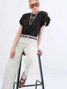 A Textured Short-Sleeve Top Featuring A Classic Round Neckline And Softly Ruffled Sleeves. Designed With A Lightweight Feel And An Easy Silhouette, This Versatile Piece Adds A Subtle Statement To Everyday Styling. - Brown - View 2