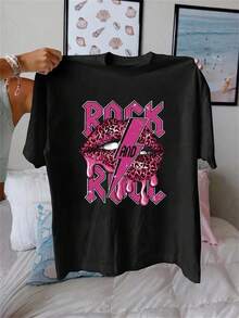 Camiseta Gráfica de Rock 'n' Roll Negra para Mujer - Labios Rosados Atrevidos, Letras de ROCK AND ROLL - Camiseta Casual para Conciertos, Regalo de Cumpleaños para Mujeres y Adolescentes - Lavable a Máquina, Top de Ropa Urbana para Uso Diario, Atuendo para Festivales, Diseño y Tela Cómoda, Blusa Elegante, Ropa Y2k, Camiseta, Camisa - Negro - Ver 10