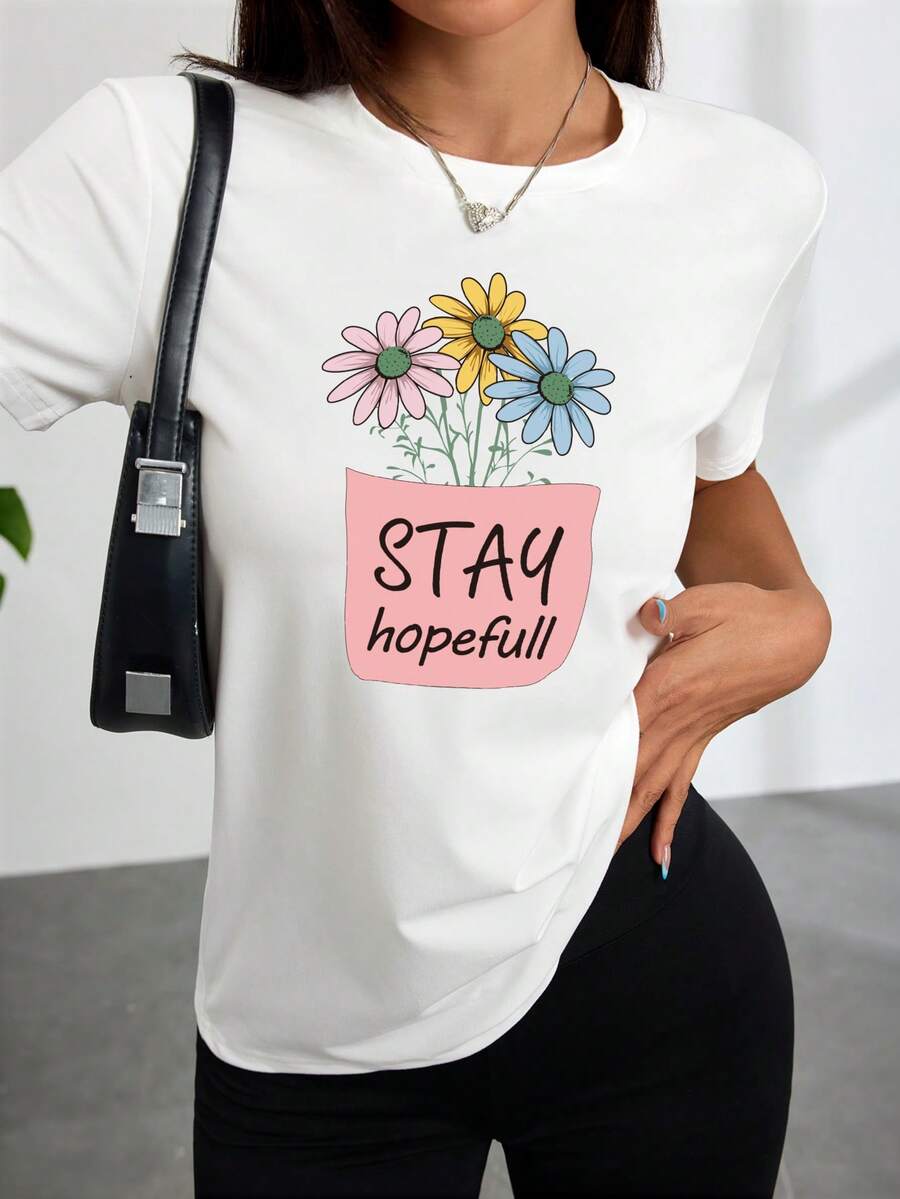 Camiseta blanca de mujer con estampado frontal con un diseño floral esperanzador, perfectara salidas informales y relación
