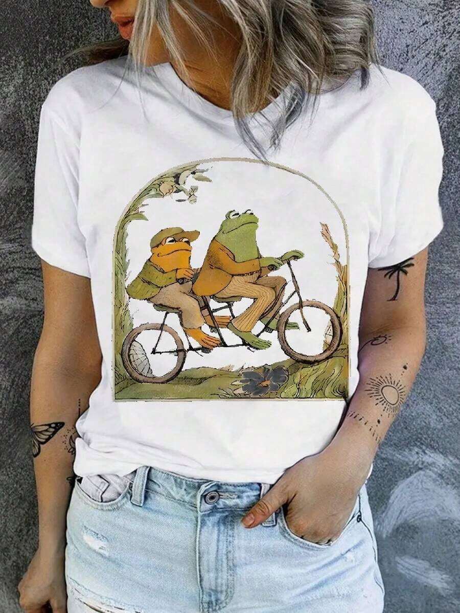 Camiseta Vintage con Estampado de Rana de Dibujos Animados Vibrante y Cuello Redondo - Tejido de Poliéster Suave con Microelasticidad, Largo Regular, Camiseta Casual de Manga Corta para Primavera y Verano, Ropa de Moda para Mujer con Estampado Posicionado, 100% Algodón. - Blanco - Ver 1