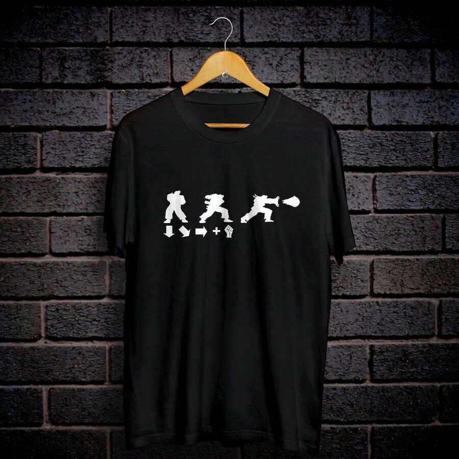 Camiseta S1STREET FIGHTER Hadouken Button Commands de 220 g, de algodón suave, para hombre y mujer. Confeccionada con un tejido premium, duradero y agradable al tacto, se adapta a todo tipo de cuerpo y es ideal para el uso diario. Prendas casuales, transpirables y ligeras, perfectas para combinar con conjuntos de otoño, ideales para el día a día, actividades al aire libre, viajes, vacaciones y fiestas temáticas durante todo el año. - Negro - Ver 1