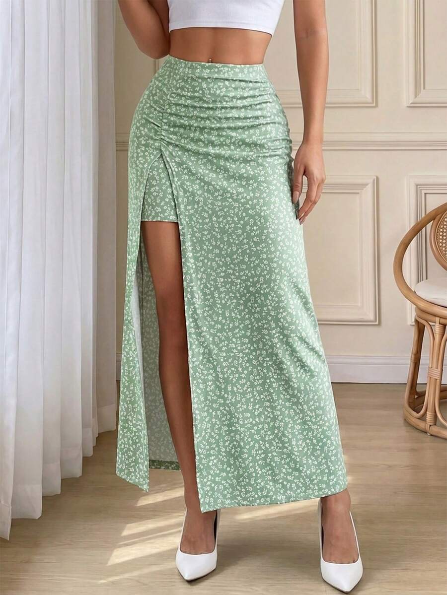 Đầm lửng thanh lịch xẻ tà bên, họa tiết hoa nhí trên nền xanh nhạt, thích hợp cho kỳ nghỉ, hẹn hò, làm vườn và các dịp khác, thiết kế cạp cao giúp tôn dáng. - màu xanh lá - Xem 1