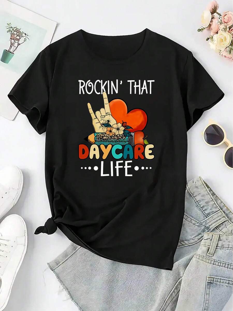 100% Algodón Talla Grande - Talla Grande - Camiseta Gráfica para Mujer, Celebrando la Vida en la Guardería - Camiseta negra de manga corta con un divertido diseño de cabeza que se mueve y un patrón de corazones, hecha de tela ligera, perfecta para uso casual, con un diseño divertido. | Top estampado interesante | Tela elástica para uso diario informal - Negro - Ver 1