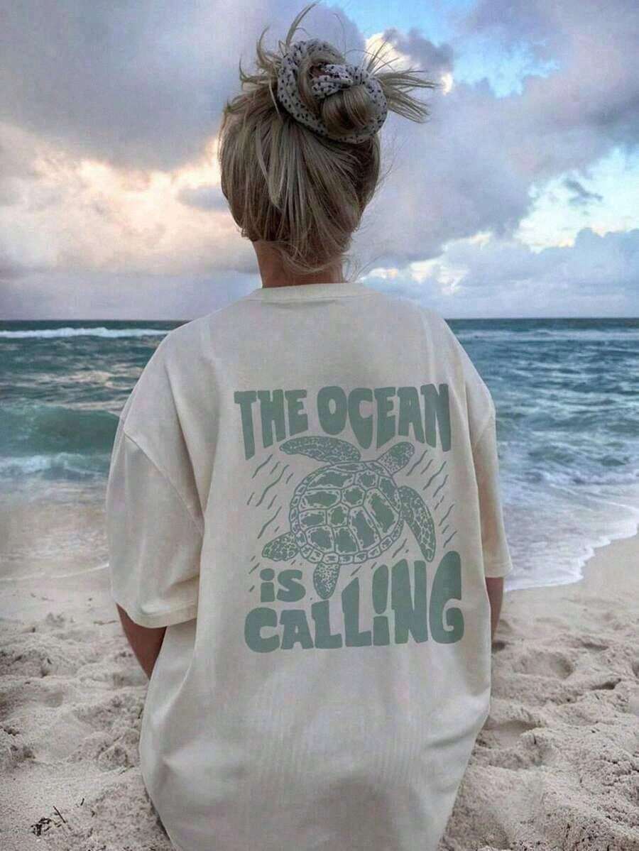 Women's 100% Cotton Plus Size T-Shirts - Oversized Short Sleeve Crew Neck T-Shirt With "The Ocean Is Calling" Sea Turtle Graphic Print, Beach Vacation Aesthetic, Casual Summer Top For Everyday Use, Hen Party - White - View 1