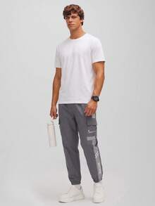 CZRLHYT Pantaloni kaki largi pentru bărbați, cu buzunare cu clapă, pantaloni jogger kaki pentru bărbați, de vară, cu talie cu șnur, cu design lateral unic, potriviți pentru diverse activități în aer liber, talie cu șnur, buzunare laterale, toamnă - Gri - Vizualizare 2