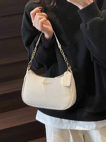 这款时尚新款多功能女士单肩包采用PU材质，饰有向日葵吊坠，并印有多色图案。它既可以作为单肩包，也可以作为腋下包使用，适合购物、通勤、外出和参加聚会等场合。 - 米色 - 查看 4