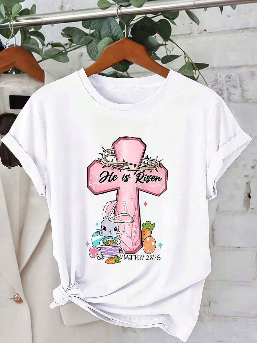 1 pieza de camiseta para mujer de 180g - Camiseta de Pascua con cruz rosa y conejo "He Is Risen" |   Camiseta de manga corta con cuello redondo y corte holgado, adecuada para el Día de San Patricio, San Valentín y celebraciones del 250º aniversario. |   Blusa de Estilo Casual para Eventos Religiosos y Uso Diario, 180g, 100% Algodón - Blanco - Ver 1