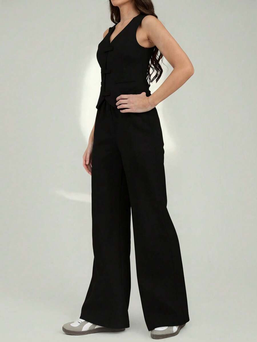 A Vest And Wide-Leg Trouser Set With Oriental-Style Closures, This Elegant Design Defines The Silhouette And Flatters All Figures. The Textured Fabric Offers Both Elegance And Comfort; It's Durable And Drapes Beautifully. Ideal For Office Looks, Casual Outings, Or Special Events, It Pairs Well With Any Accessory And Suits Any Occasion. A Versatile And Sophisticated Piece That's A Must-Have In Your Wardrobe. - 黑色 - 查看 1