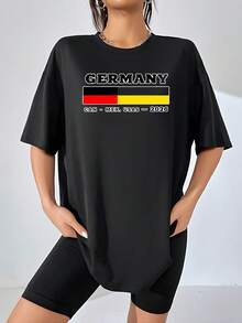 German Flag With The Text "Germany" And A Reference To The 2026 Tournament, Symbolizing National Pride And Sporting Passion, Combining The Colors Black, Red, And Yellow, Evoking Unity And Positive Energy. Women's T-Shirt, 100% Cotton, Casual, Comfortable For Football Fans. - 黑色 - 查看 1