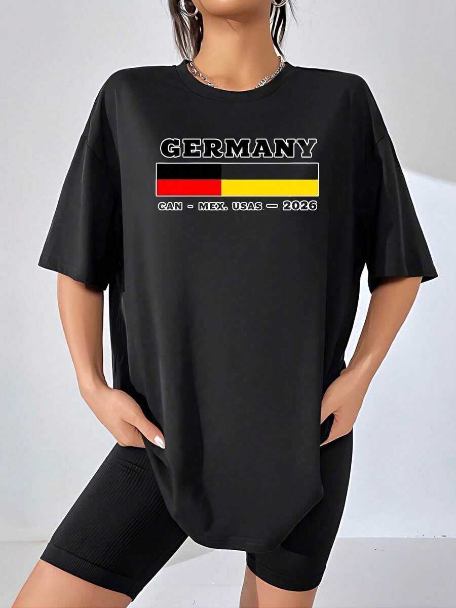 German Flag With The Text "Germany" And A Reference To The 2026 Tournament, Symbolizing National Pride And Sporting Passion, Combining The Colors Black, Red, And Yellow, Evoking Unity And Positive Energy. Women's T-Shirt, 100% Cotton, Casual, Comfortable For Football Fans. - 黑色 - 查看 1