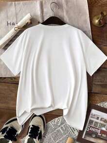 Camiseta blanca de manga corta y cuello redondo para mujer con un divertido estampado de una carita graciosa. - Blanco - Ver 3