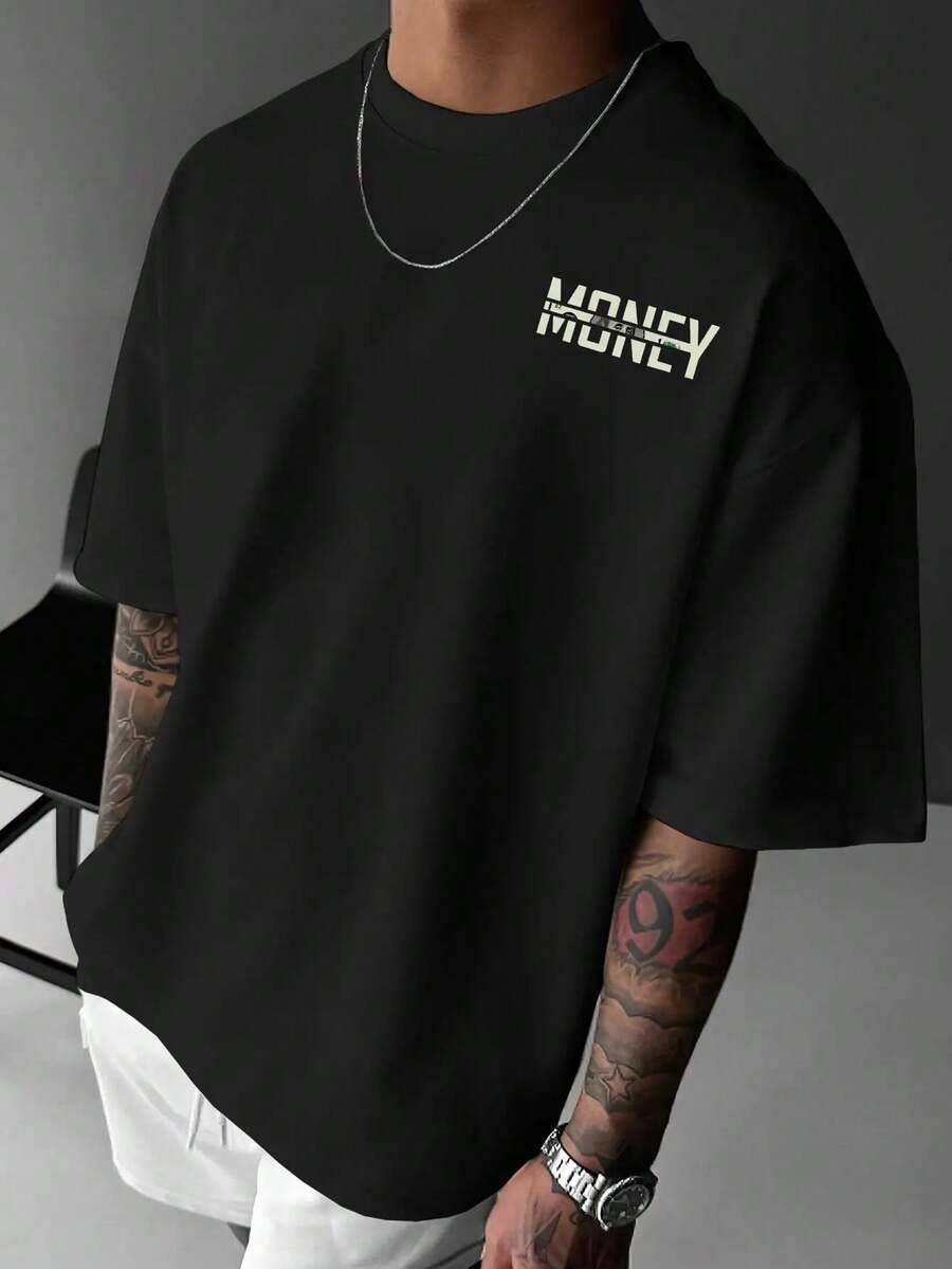 Camiseta Blanca con Estampado de Dinero para Hombre y Mujer - Diseño de Símbolo de Dólar y Moneda, Cuello Redondo, Manga Corta, Estilo Casual de Verano, Ajuste Cómodo y Transpirable para Ropa Informal, Estampado Trasero con Patrón de Billete de Dólar Estadounidense, Regalo Ideal para Amantes de las Finanzas, Regalo de Cumpleaños o Graduación, Lavable a Máquina, Corte Regular, Estampado Trasero con Patrón Geométrico de Billetes de Dólar, Adecuada para las Temporadas de Primavera y Verano, Camiseta Y2k - Negro - Ver 1