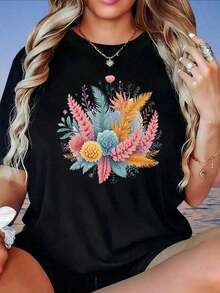 Camiseta Blanca Holgada con Estampado Floral para Mujer, Top Casual de Verano, Estilo Boho, Camiseta Gráfica con Diseño de Hojas y Flores Coloridas, Camiseta de Mujer, Estilo Vintage Urbano, Unisex, de Algodón, Manga Corta, Cuello Redondo, blusas para mujer, playeras de mujer, blusas casuales para dama. - Negro - Ver 1