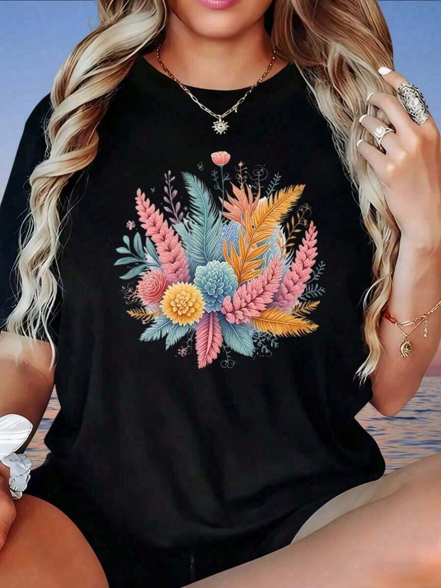 Camiseta Blanca Holgada con Estampado Floral para Mujer, Top Casual de Verano, Estilo Boho, Camiseta Gráfica con Diseño de Hojas y Flores Coloridas, Camiseta de Mujer, Estilo Vintage Urbano, Unisex, de Algodón, Manga Corta, Cuello Redondo, blusas para mujer, playeras de mujer, blusas casuales para dama. - Negro - Ver 1