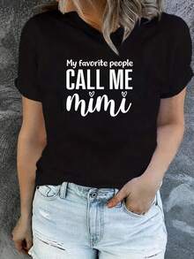 GiftThis - Camiseta Casual de Manga Corta para Mujer, con Corte Holgado y un Diseño Cómodo y Elegante, Ideal para Uso Diario en Primavera y Verano. Incluye la frase "Mis seres queridos todos me llaman Mimi". Suave - Negro - Ver 1