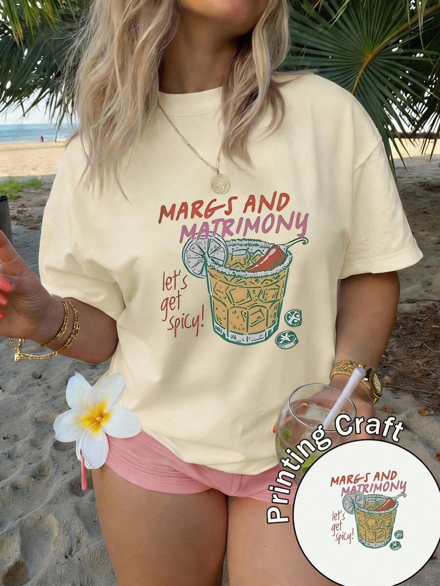 Camiseta de mujer verano 2026 con estampado de margarita y texto 'MARGS AND MATRIMONY', diseño casual, fácil de lavar, ideal para viajes y uso diario - Albaricoque - Ver 1