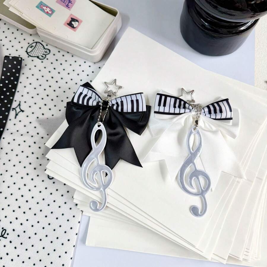 1 chiếc móc khóa hình phím đàn piano và nơ màu đen trắng kiểu retro, phụ kiện túi xách đa năng bằng satin hình nơ dành cho bé gái. - Nhiều màu - Xem 1