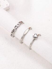 Set de 3 anillos de acero inoxidable con forma de corazón hueco en color plateado, anillos minimalistas lisos apilables, anillos elegantes y elegantes para mujeres - Plateado - Ver 6